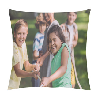 Personality  Selective Focus Of Multicultural Children Competing In Tug Of War In Park  Pillow Covers