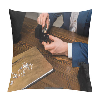 Personality  Cropped View Of Jewelry Appraiser Examining Jewelry Ring With Magnifying Glass Near Gemstones On Wooden Table  Pillow Covers