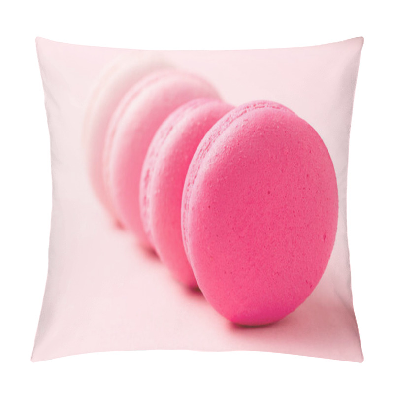 Personality  selective focus of sweet colorful macarons on pink surface pillow covers