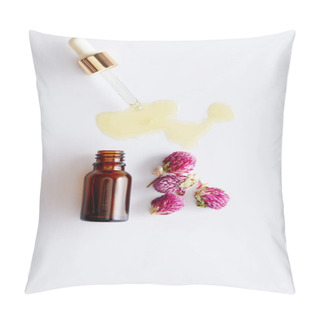 Personality  Top View Of Cosmetic Oil Flowing Out Of Dropper Next To Bottle And Pink Buds On White Background Pillow Covers