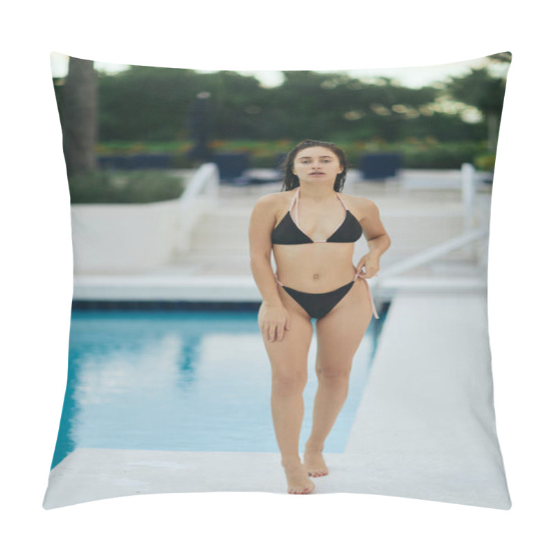 Personality  captivating and confident woman dressed in a stunning and sexy black bikini standing next to outdoor swimming pool in the vibrant city of Miami, USA, luxury resort, blurred background  pillow covers