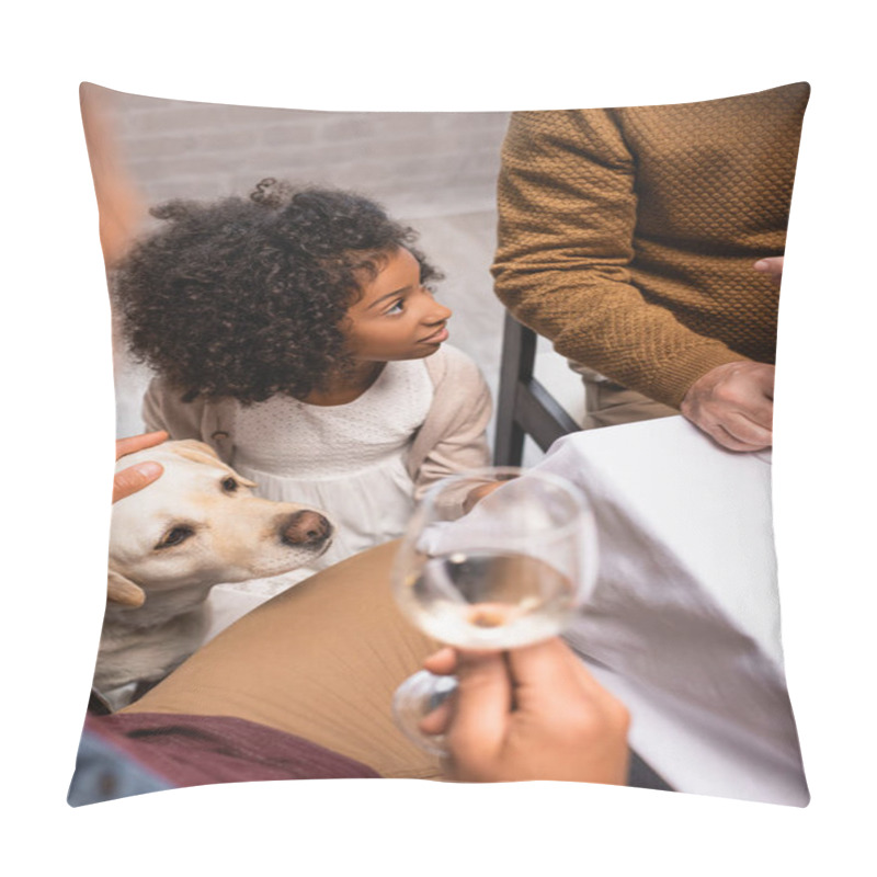 Personality  selective focus of man stroking golden retriever and holding glass of white wine during thanksgiving dinner pillow covers