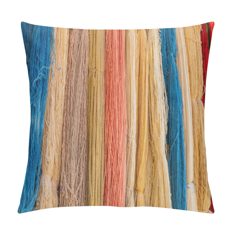 Personality  Several small bundles in different colors of a naturally dyed wool pillow covers