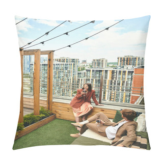 Personality  A Man And A Woman Sit Relaxed On A Rooftop, Admiring The View As The Sun Sets Behind Them, Casting A Warm Glow On The City Below Pillow Covers