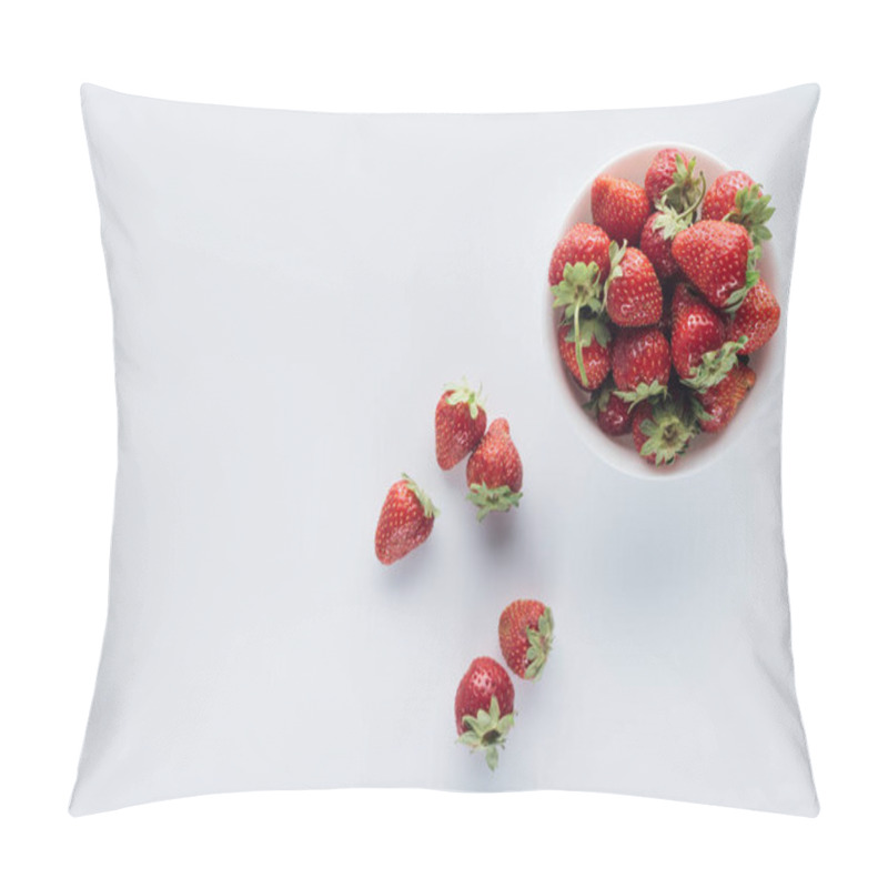 Personality  top view of bowl of fresh whole strawberries on white surface pillow covers