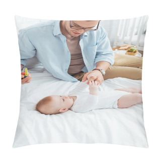 Personality  Happy Young Father Holding Baby Rattle While Touching Hands Of Cute Little Son Pillow Covers
