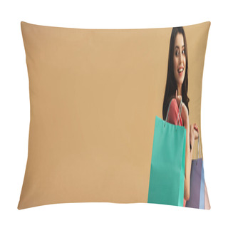 Personality  Panoramic Shot Of Smiling And Beautiful Woman Holding Shopping Bags Isolated On Beige Pillow Covers