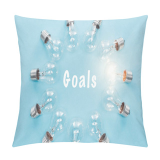 Personality  Circle Of Light Bulbs With Glowing One Surronding 'goals' Word On Blue, Goal Setting Concept Pillow Covers