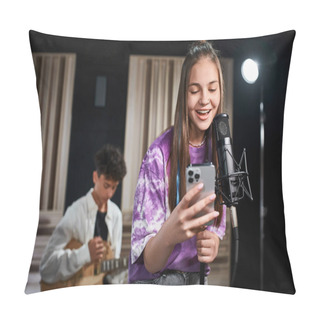 Personality  Jolly Adorable Teenage Girl Singing And Looking At Smartphone Next To Her Blurred Guitarist Pillow Covers