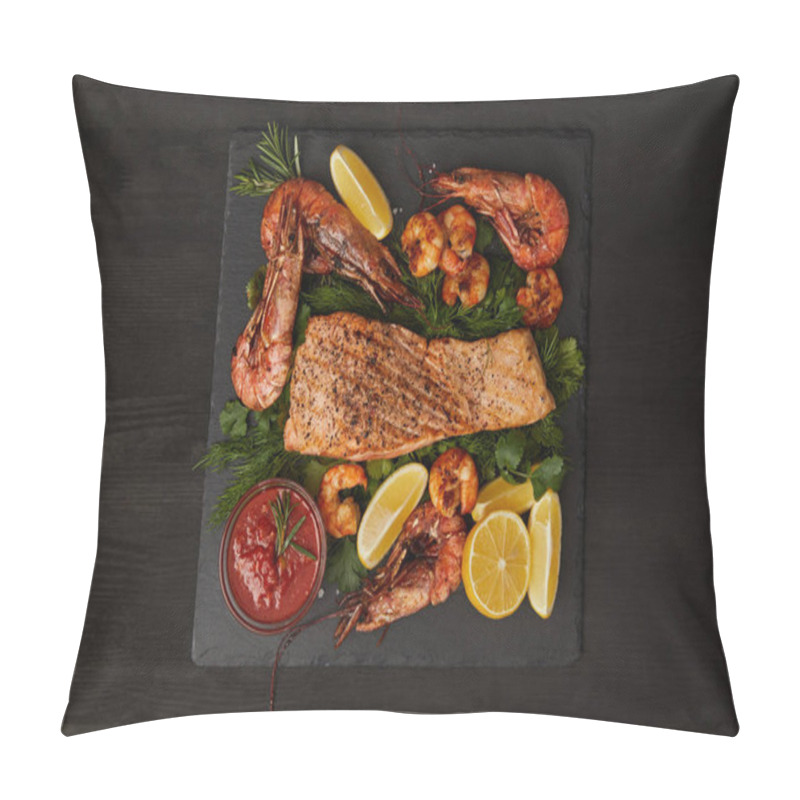 Personality  Top View Of Grilled Salmon Steak, Shrimps, Pieces Of Lemon And Sauce On Black Surface Pillow Covers