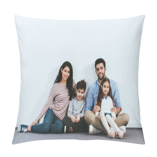 Personality  Happy Hispanic Family Sitting On Floor Near White Wall  Pillow Covers
