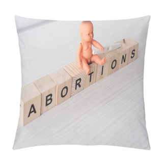 Personality  Baby Doll Near Pregnancy Test And Wooden Cubes With Lettering On Wooden Table  Pillow Covers