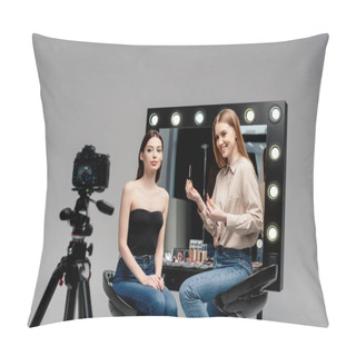 Personality  Selective Focus Of Happy Makeup Artist Holding Lip Gloss Near Model And Digital Camera Isolated On Grey  Pillow Covers
