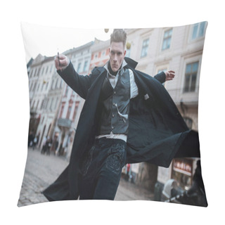 Personality  Young Man In Image Of Black Magician Walks On City Street With Magic Wand In His Hand. Pillow Covers