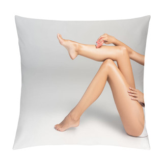 Personality  Cropped View Of Woman In White Underwear Shaving Leg With Epilator, While Sitting On Grey Pillow Covers