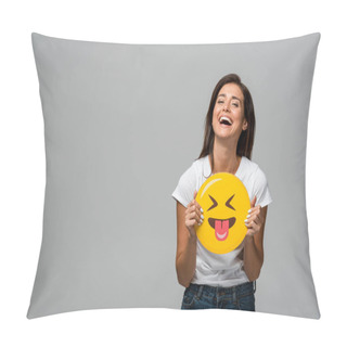 Personality  KYIV, UKRAINE - SEPTEMBER 10, 2019: Laughing Girl Holding Yellow Sticking Tongue Out Emoji, Isolated On Grey Pillow Covers