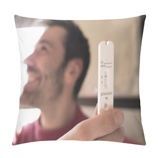 Personality  Optimistic Scene: A Man With Black Hair And Beard Displays A Negative COVID Test, Exuding Happiness. Soft Focus Captures His Joyful Gaze By The Window Pillow Covers