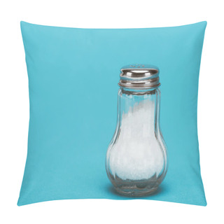 Personality  Salt Crystals In Glass Salt Shaker With Metallic Cap On Blue Background With Copy Space Pillow Covers