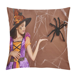 Personality  Girl In Witch Hat And Halloween Costume Pointing At Fake Spider On Brown Background, Spooky Season Pillow Covers