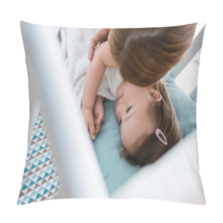 Personality  Overhead View Of Mother Touching Child With Down Syndrome In Crib At Home  Pillow Covers