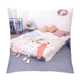 Personality  High Angle View Of Interior Of Modern Bedroom With Hanger Full Of Various Female Clothing And Makeup Supplies On Bed Pillow Covers