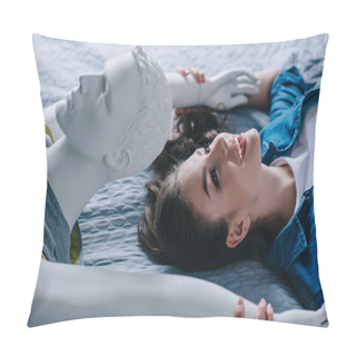 Personality  Side View Of Smiling Woman And Mannequin Lying On Bed, Loneliness Concept Pillow Covers