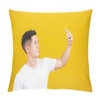 Personality  Asian Handsome Young Man Smiling Positive Saying Hi Talking By Video Call With Mobile Phone, Excited Happy Male Taking Selfie On Smartphone Studio Shot Isolated On Yellow Background Pillow Covers
