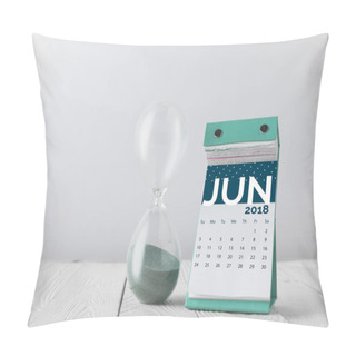 Personality  Close Up View Of Hourglass And June Calendar On Wooden Tabletop Isolated On White Pillow Covers