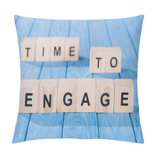 Personality  Close Up View Of Arranged Wooden Blocks Into Time To Engage Phrase On Blue Wooden Surface  Pillow Covers