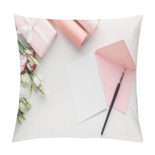 Personality  Top View Of Pink Envelope With Empty Card And Ink Pen, Flowers, Wrapped Gift, Rolls Of Paper On Grey Background Pillow Covers