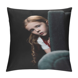 Personality  Anxious Child Looking At Camera While Hiding Behind Armchair Isolated On Black Pillow Covers