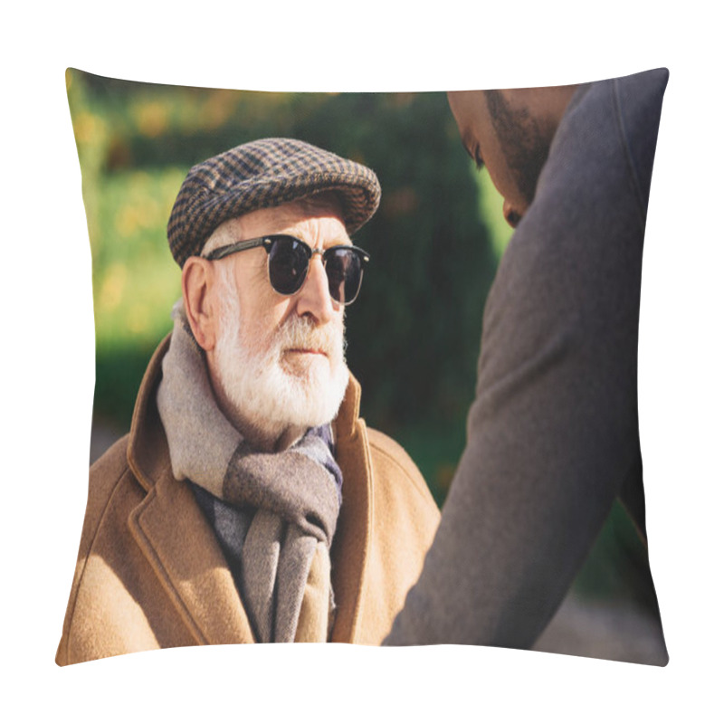 Personality  Close-up Shot Of Senior Man Looking At African American Man On Street Pillow Covers