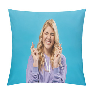 Personality  Tense Blonde Teenage Girl With Closed Eyes Holding Crossed Fingers And Wishing Luck On Blue Pillow Covers