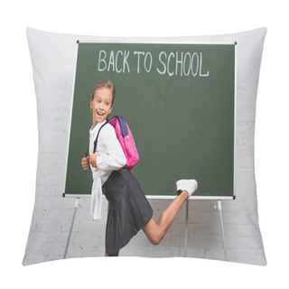 Personality  Cheerful Schoolgirl With Backpack Standing On One Leg Near Chalkboard With Back To School Inscription Pillow Covers