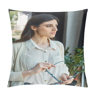 Personality  A Businesswoman Stands Confidently In Front Of A Window, Gazing Outside In A Modern Office Setting Near Her Workspace. Pillow Covers