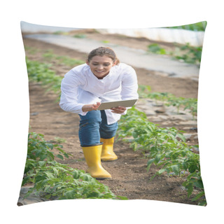 Personality  Young Agronomist Using Tablet Technology To Collect Data In Modern Agriculture. Female Farmer Crouching Looking Touching Tomato Plant In Greenhouse.  Pillow Covers