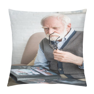 Personality  Calm Senior Man Holding Photo Album And Glasses In Hands Pillow Covers