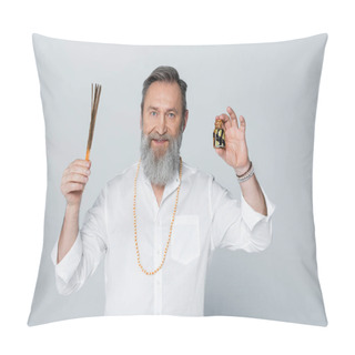 Personality  Ayurveda Guru With Aroma Sticks And Scented Oil Smiling At Camera Isolated On Grey Pillow Covers