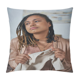 Personality  Sad African American Woman Holding Baby Clothes And Crying In Bedroom, Miscarriage Concept Pillow Covers