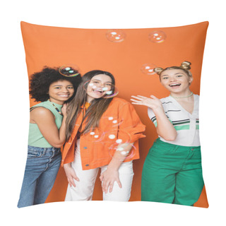 Personality  Soap Bubbles Near Positive And Interracial Teenage Girlfriends In Casual Outfits Looking At Camera On Orange Background, Teen Fashionistas With Impeccable Style Concept Pillow Covers