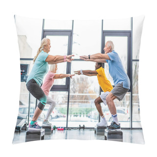 Personality  Side View Of Multicultural Senior Athletes Synchronous Doing Squats On Step Platforms At Gym Pillow Covers