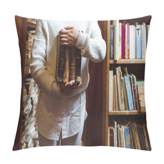 Personality  Partial View Of Woman In White Sweater Holding Books In Library  Pillow Covers