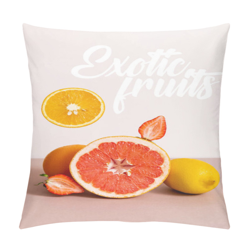 Personality  fruit composition with citrus fruits and strawberry near exotic fruits lettering on beige pillow covers