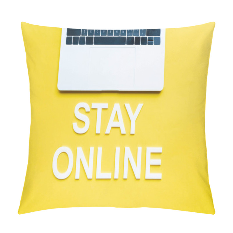 Personality  Top view of stay online lettering and laptop on yellow surface pillow covers