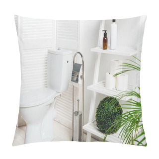 Personality  Interior Of White Modern Bathroom With Toilet Bowl Near Folding Screen, Laundry Basket, Rack And Plants Pillow Covers