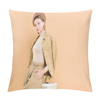 Personality  Trendy Girl In Beret Standing With Hand In Pocket Near Chair Isolated On Beige  Pillow Covers