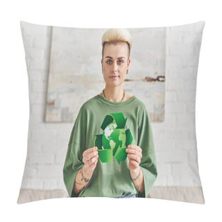 Personality  Positive Tattooed Woman With Trendy Hairstyle Showing Green Recycling Sign With Globe While Smiling At Camera In Modern Living Room, Sustainable Living And Environmental Awareness Concept Pillow Covers