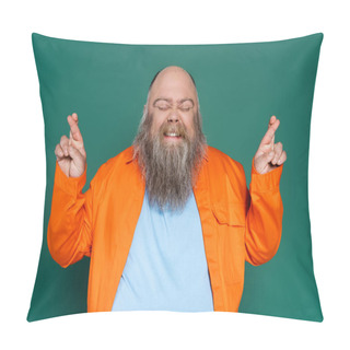 Personality  Tense Bearded Man With Closed Eyes Holding Crossed Fingers For Luck Isolated On Green Pillow Covers