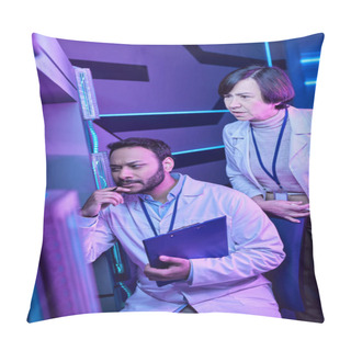 Personality  Hindu Male And Adult Female Scientists Gaze Mysteriously At Computer In Neon-Lit Science Center Pillow Covers