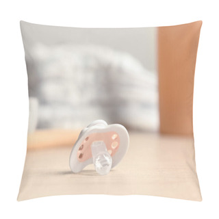 Personality  Baby Pacifiers On Beige Table Against Blurred Background, Space For Text Pillow Covers
